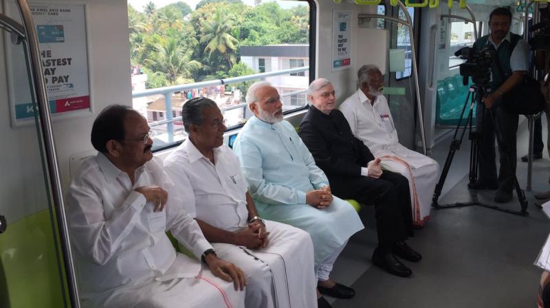Prime Minister Narendra Modi takes a ride in Kochi Metro.
