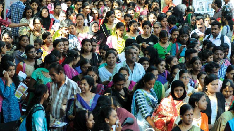 The rush for the written test for selection of Lower Division Clerk examination (LDC) at Cotton Hill Higher Secondary School in Thiruvananthapuram on Saturday. (Photo: DC)