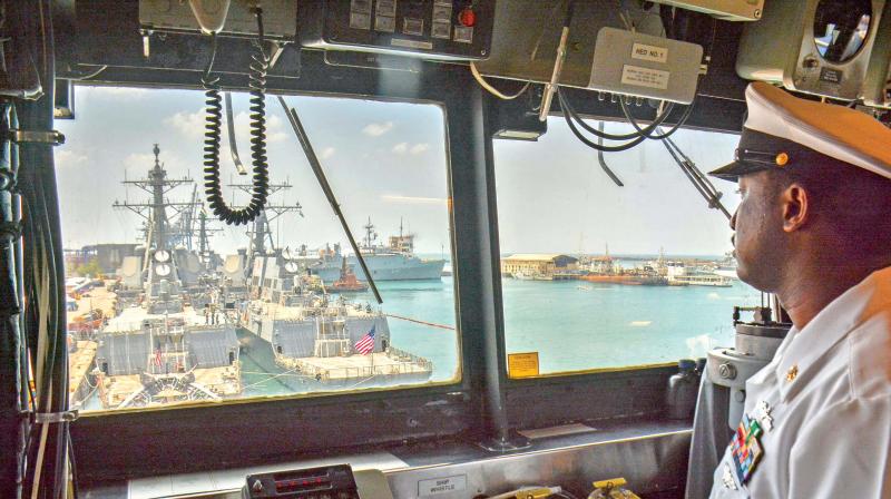 A Navy personnel explains the navigation procedure at Chennai Port on Monday (Photo: DC)