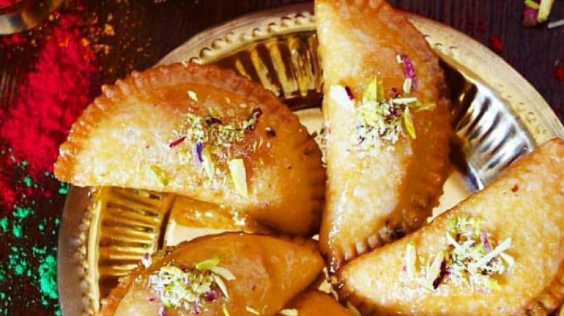No Holi party is complete without gujiya, the sweet dumplings made with flour and a delicious filling of khoya or coconut. (Photo: Instagram)