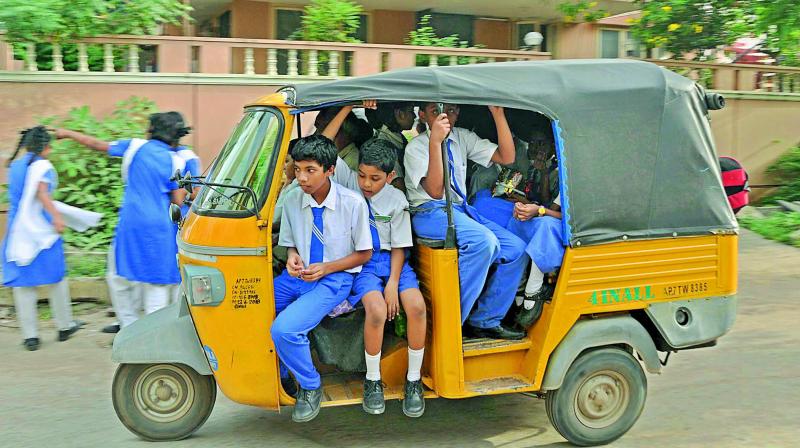 An autorickshaw overloaded  with schoolchildren is a common sight in Guntur. (Photo: DC)