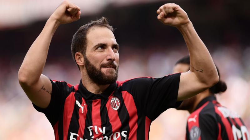 Milan paid 18 million euros ($20.75 million) to sign Higuain on loan, with a clause to make the deal permanent for a further 36 million euros. (Photo AFP)