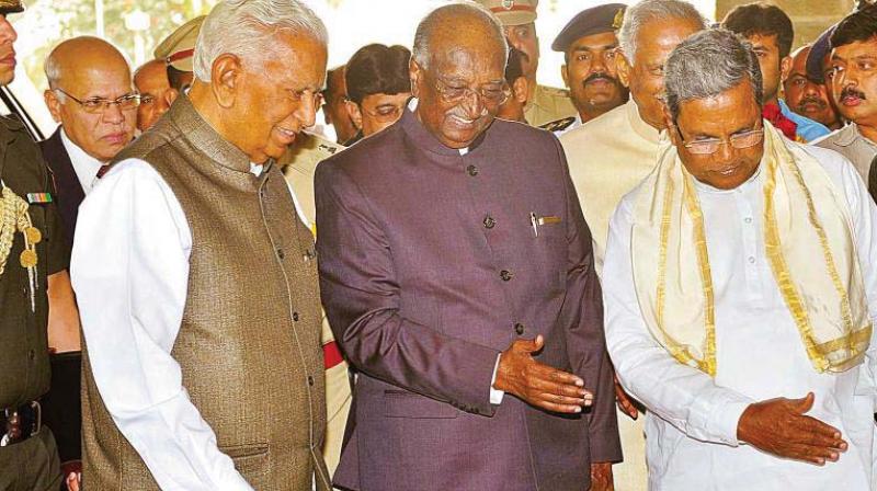 A file photo of Legislative Council Chairman D.H. Shankaramurthy and CM Siddaramaiah receiving Governor Vajubhai Vala at the Vidhana Soudha