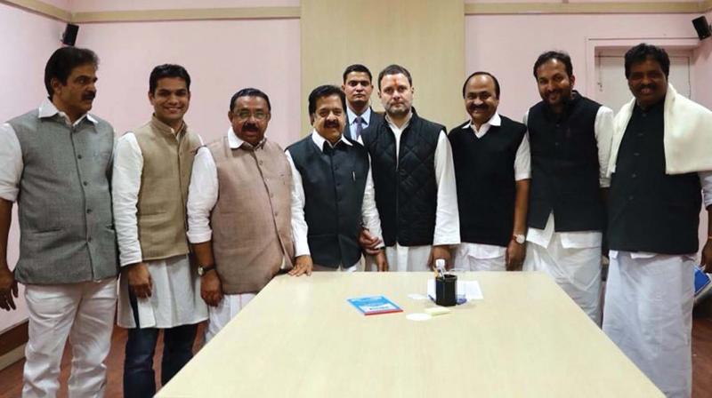 AICC vice-president Rahul Gandhi with Congress leaders from Kerala after he submitted nomination papers for the post of AICC president in New Delhi on Monday. (From left) AICC general secretary K. C. Venugopal, MP, Hibi Eden, MLA, KPCC president M.M. Hassan, opposition leader Ramesh Chennithala,  V. D. Satheesan, MLA, AICC secretary P. C. Vishnunath and Kodikunnil Suresh, MP.	(Photo: BY ARRANGEMENT)