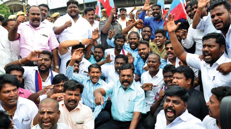 VKC members led by their party chief Thol  Thirumavalavan stage a flash protest demanding stringent action against a miscreant who hurled his shoe at the statue of Periyar, in Chennai, on Monday.   (Photo:DC)