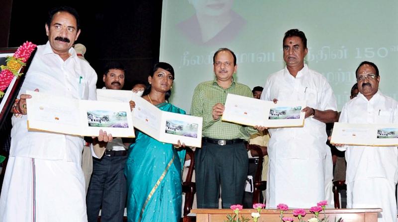 S.P.Velumani, Minister for Municipal Administration,  released a special postal cover to mark the 150th anniversary of the formation of Nilgiris district.(Photo:DC)