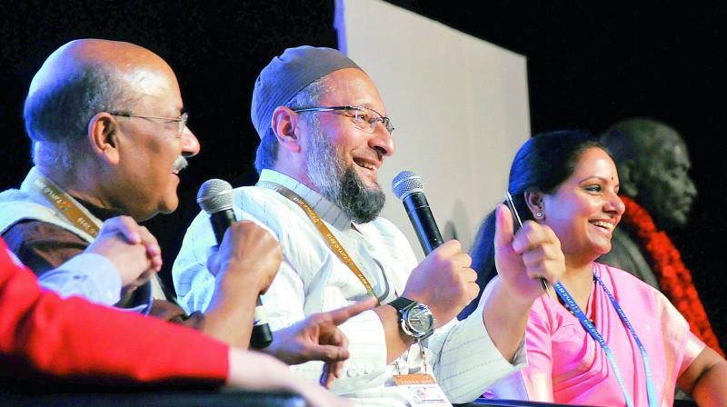 MIM president Asaduddin Owaisi along with TRS leader Kalvakuntla Kavitha at a panel discussion Walk the talk at the Telangana Jagruthi International Youth Leadership Conference, 2019, at HICC in Hyderabad on Saturday. 	 	 DC