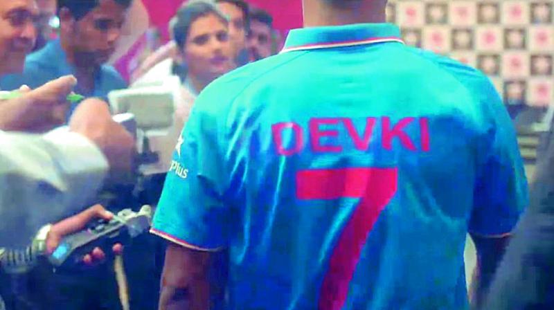 In a new ad, Dhoni can be seen wearing a jersey with his mothers name on the back
