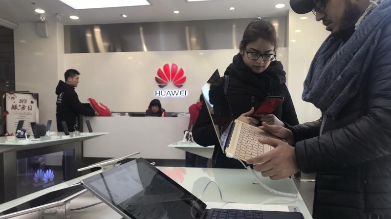 Huawei has never been asked by any government to build any backdoors or interrupt any networks, and we would never tolerate such behavior by any of our staff,  said Huawei. (Photo: AP)