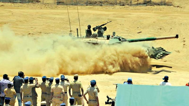Defence personnel showcase their capability of warfare.  Indian tank demonstrates its prowess in DefExpo. (Photo: DC)