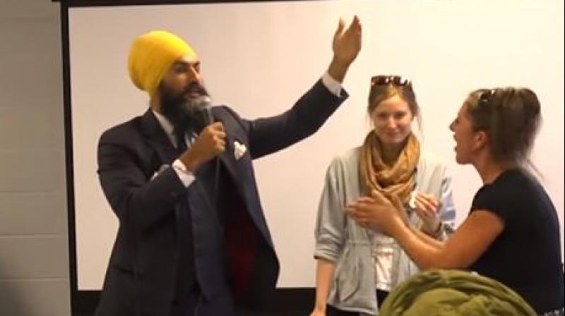 After four full minutes of her rant, the woman left the camping event after Singh attempted to postpone his address and was about to leave the dais. (Photo: Videograb)