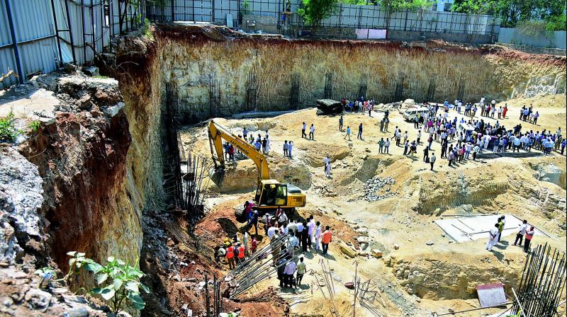 A view of the portion of land that caved in at Kondapur, killing two construction workers.