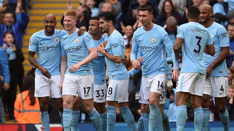 Having already won a record 18 straight games this season, City is within reach of more milestones to underline one of the most stunning seasons in English soccer. (Photo: AP)