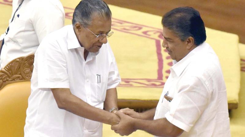 Chief Minister Pinarayi Vijayan greets Saji Cherian, MLA, after he took oath at Legislative Assembly on Monday. (Photo: A.V. Muzafar )