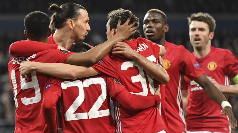 Manchester United players celberate after Henrikh Mkhitaryan opened the scoring against Anderlecht. (Photo: AP)