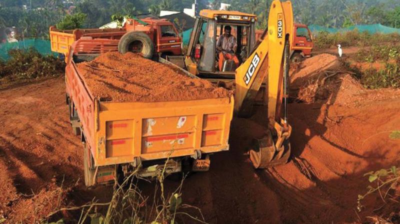 Red earth mining in progress. 	(Photo:  DC)