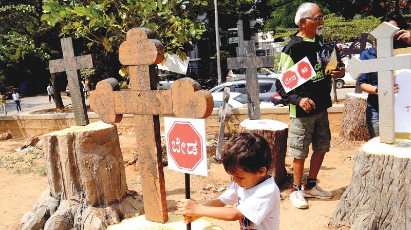 Volunteers take part in Steel Bridge Beda, a day-long Satyagraha against the construction of the proposed steel flyover, at Freedom Park in Bengaluru on Sunday  (Photo: Shashidhar B.)