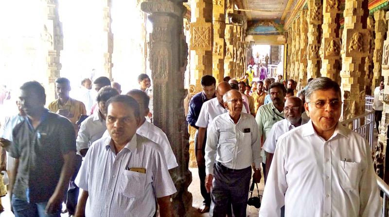 The 12-member expert committee carrying out  inspection at Meenakshi Amman Temple in Madurai  on Thursday. 	 DC