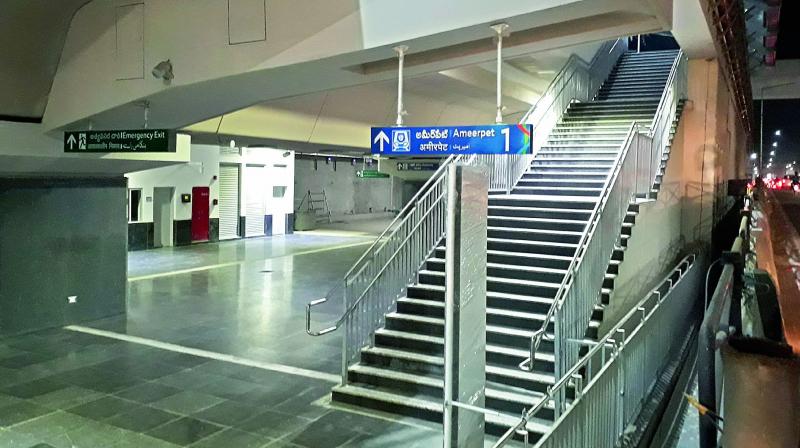 A staircase at the Metro Rail station indicates that the train will go only till Ameerpet. (Photo: Gandhi)