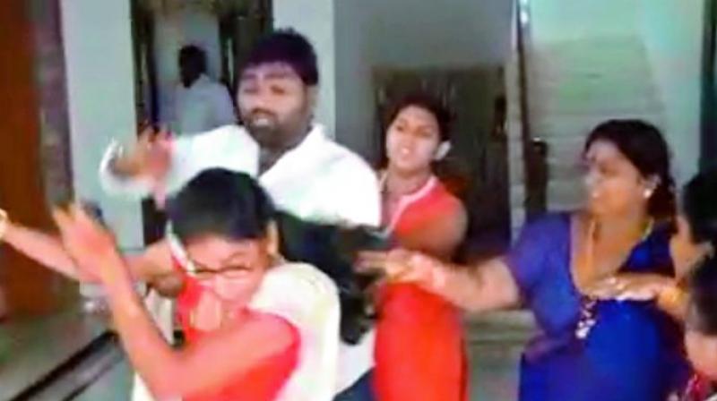 Video grab of TRS leader Srinivas Reddy abusing his wife at his residence.