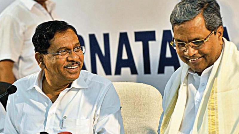 A file photo of PCC chief Dr G. Parameshwar with CM Siddaramaiah in happier times.