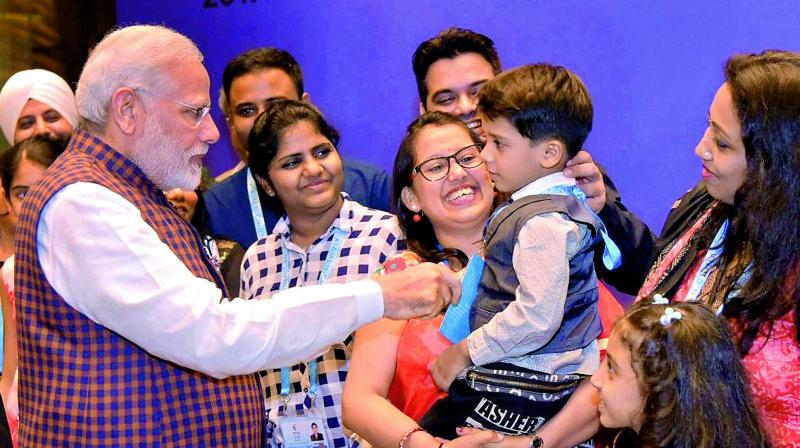Prime Minister Narendra Modi being welcomed by the Indian community, in Xiamen on Sunday. (Photo: PTI)
