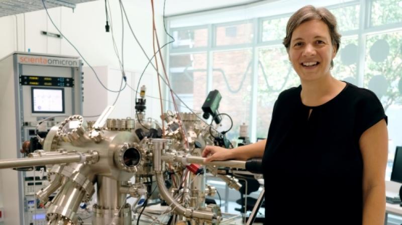 Professor Michelle Simmons with a scanning tunnelling microscope. Photo/UNSW