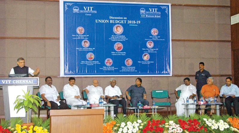 Columnist S. Gurumurthy speaks at the discussion on Union Budget at VIT Chennai campus on Sunday. VIT chancellor G.Viswanathan, CPI National Secretary D. Raja and CPM central committee member T.K. Rangarajan,  DMK MP TKS Elangovan are also seen. 	DC
