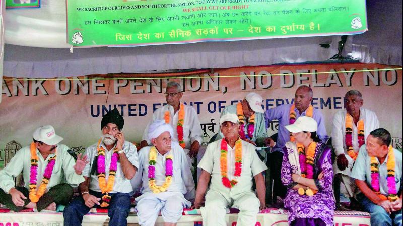 Ex-servicemen protesting over the issue of one rank one pension scheme at Jantar Mantar in New Delhi on Wednesday. (Photo: PTI)