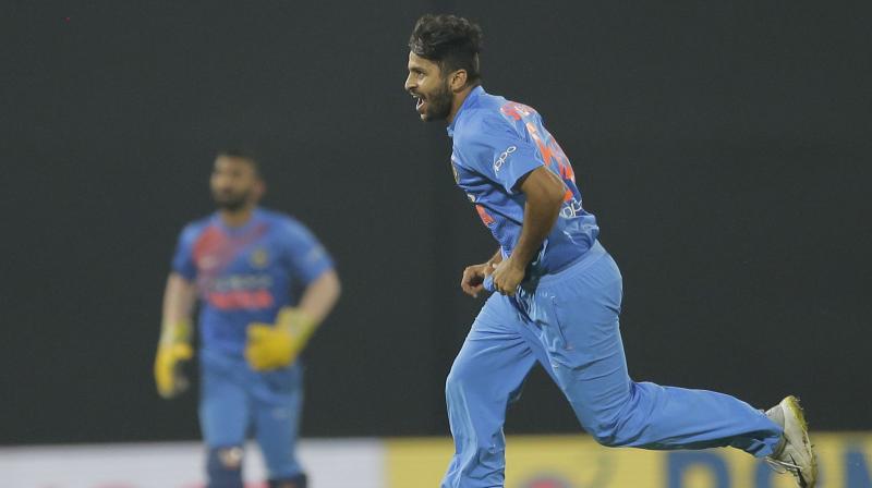 Shardul Thakur knows that opportunities in a settled limited overs line-up wont come easily and thats the reason he is ready to \step up\ in an unenvious role of Indias stop-gap third seamer in absence of Bhuvneshwar Kumar and Jasprit Bumrah. (Photo: AP()
