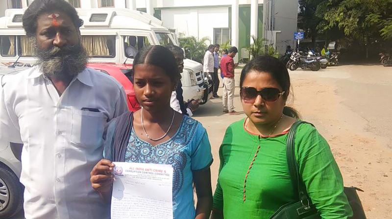 Class 9 girl petitions Coimbatore collector along with her parents  on Tuesday. (Photo: DC)
