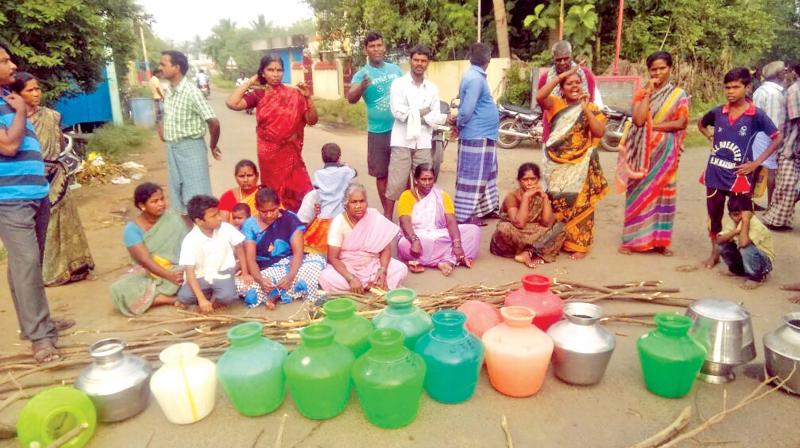 The villagers of Gandhi Nagar near Maduranthagam stage a road roko  demanding supply of drinking water on Thursday (Photo: DC)