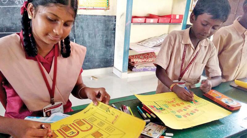 Students of Corporation school at Korukupet participate in a drawing competition, themed My dream school,   conducted on World Childrens Day. 	(Photo: DC)