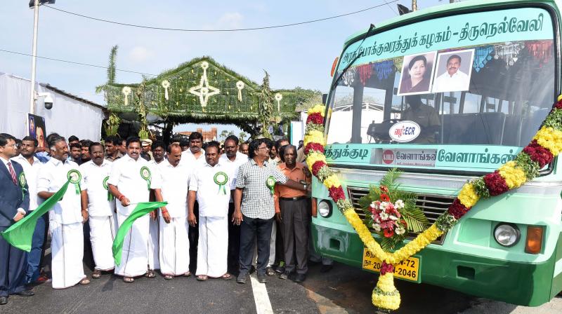 CM Palaniswami and deputy CM Paneerselvam flag off Thoothukudi-Velankanni bus route at MGR centenary celebrations held in Thoothukudi on Wednesday (Photo: DC)