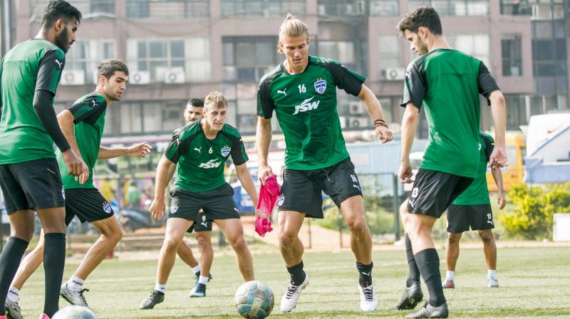 Bengaluru FC players at a training session at the Bangalore Football Stadium on Saturday.