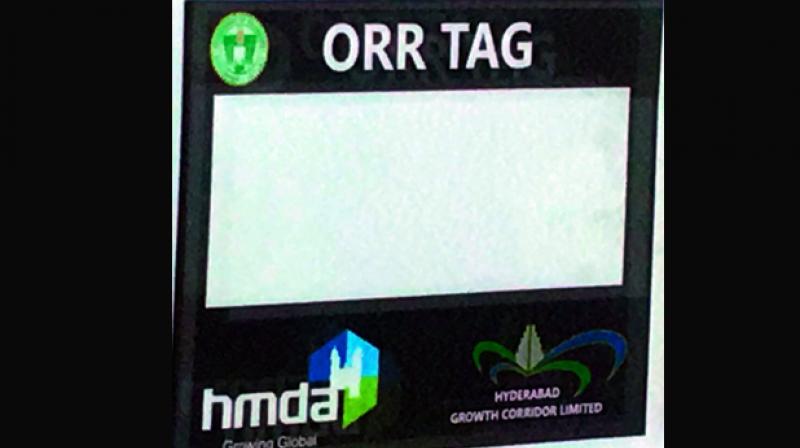 RFID tag that motorists have to attach to their car windshields to avail benefits of the electronic toll collection facility at ORR.