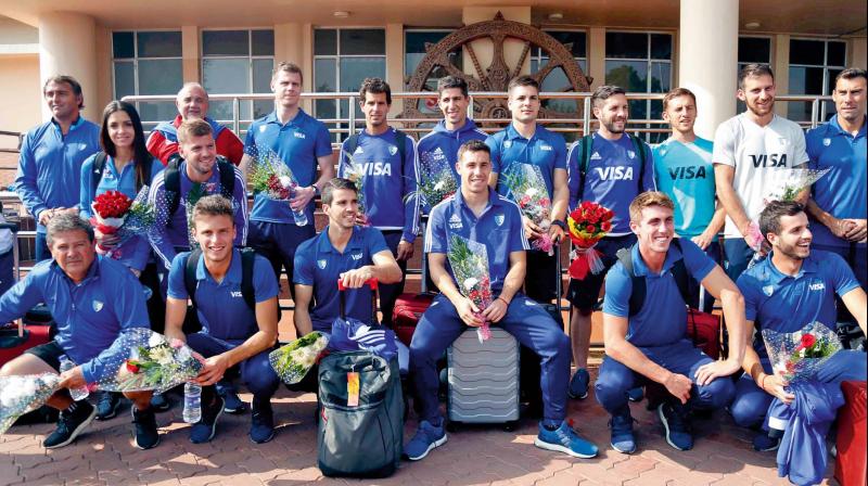 Members of the Argentina team pose in Bhubaneswar on Monday.