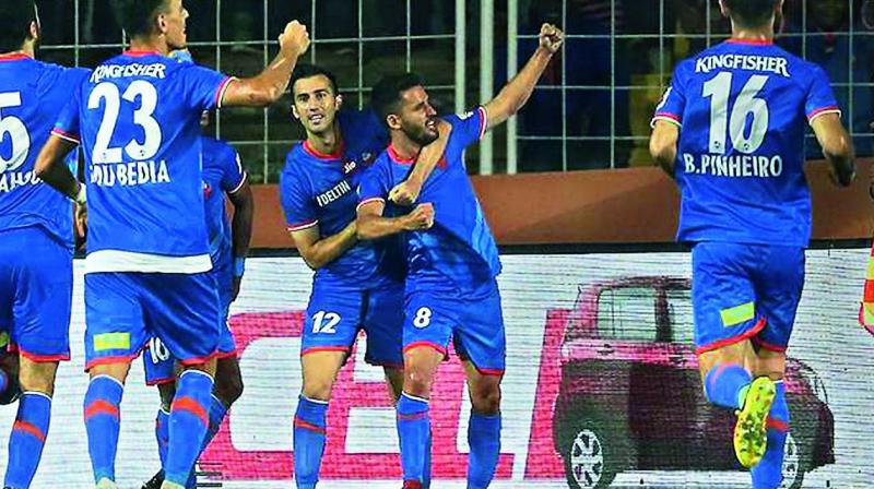 FC Goas Ferr¡n Corominas (right) celebrates after scoring against Bengaluru FC in their ISL-4 match in Margao on Thursday. The hosts won 4-3 (Photo:  ISL)
