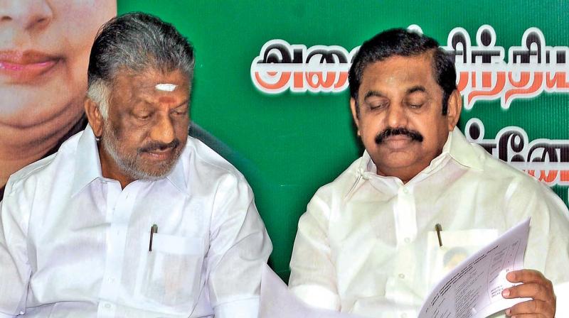 Tamil Nadu Chief Minister Edappadi K. Palaniswami and Deputy Chief Minister O Panneerselvam in AIADMK governing council meeting at the party headquarters at Royapettah on Thursday. (Photo: DC)