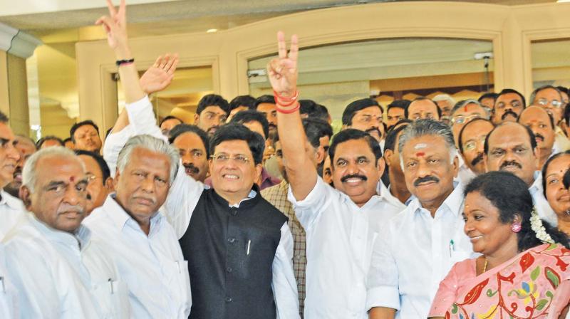 Union minister and BJPs Tamil Nadu in-charge Piyush Goyal along with Chief Minister K. Palaniswami and Deputy Chief Minister O. Panneerselvam waves after AIADMK signed an alliance with the BJP for the upcoming Lok Sabha elections, in Chennai, on Tuesday. Also seen are  BJP state unit President Tamilisai Soundararajan and Union minister Pon Radhakrishnan. (Image DC)