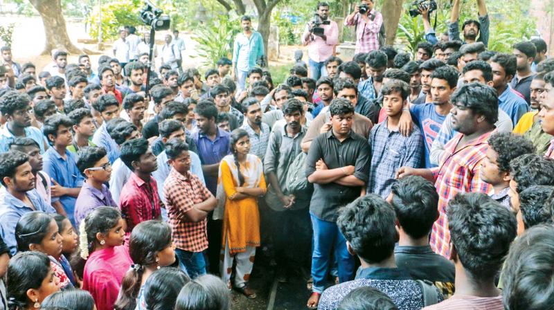 Students of Government Fine Arts college in Egmore stage a sit-in protest demanding action against their head of department following the suicide of a final year student of the college (Photo: DC)