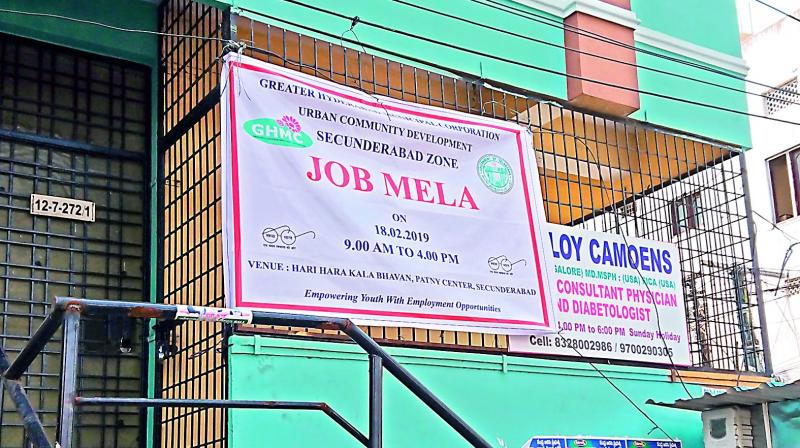 Civic body sets up unauthorised flexy around Secunderabad promoting a job mela at Hari Hara Kala Bhavan. (Image DC)