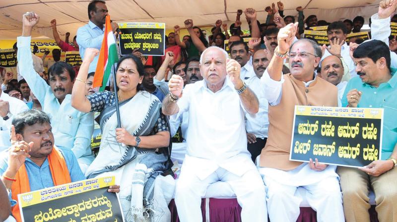 BJP workers led by state unit president B.S. Yeddyurappa protest condemning  the attack on CRPF Jawans in J&K, in Bengaluru on Sunday (Image DC)