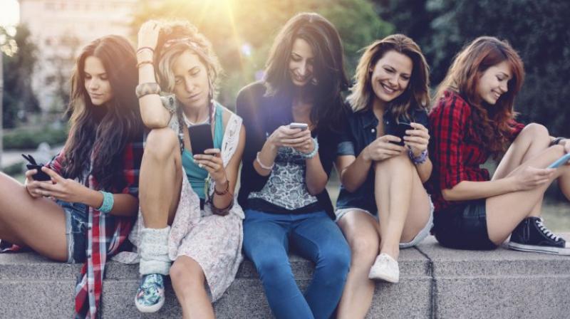 Social media usage on an average went up from an hour to two hours a day in a decade (Photo: AFP)