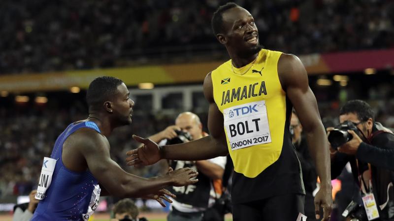 The jeering did indeed continue unabated after it became clear Justin Gatlin, a sprinter whose past divides track and field, had gatecrashed Usain Bolts party. (Photo: AP)