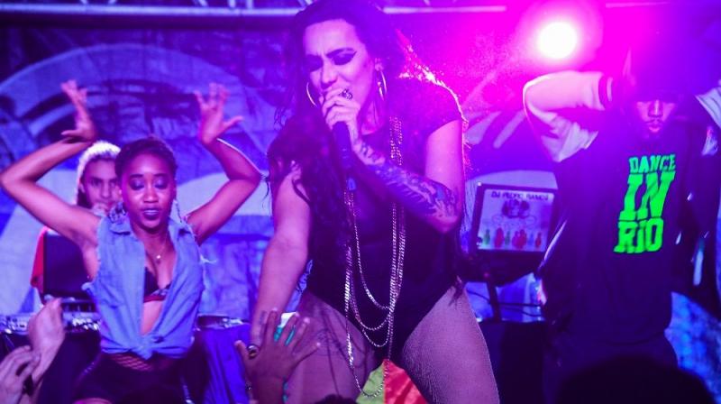 Brazilian funk performer MC Trans, seen here performing in a Rio favela, has taken her message of tolerance to a wide audience. (Photo: AFP)
