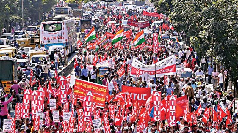 Members of various trade unions take out a procession in Bengaluru 	 DC
