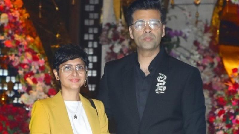 Karan Johar and Aamir Khans wife Kiran Rao pose for shutterbugs.