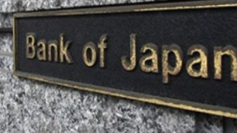 The bank did not alter monetary policy Tuesday, including its massive asset-purchase programme worth around 80 trillion yen ($763 billion) annually.