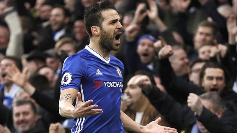 Cesc Fabregas made sure Chelsea capitalised on Tottenham Hotspurs 1-0 defeat at West Ham United on Friday by setting up goals for Diego Costa and Nemanja Matic. (Photo: AP)